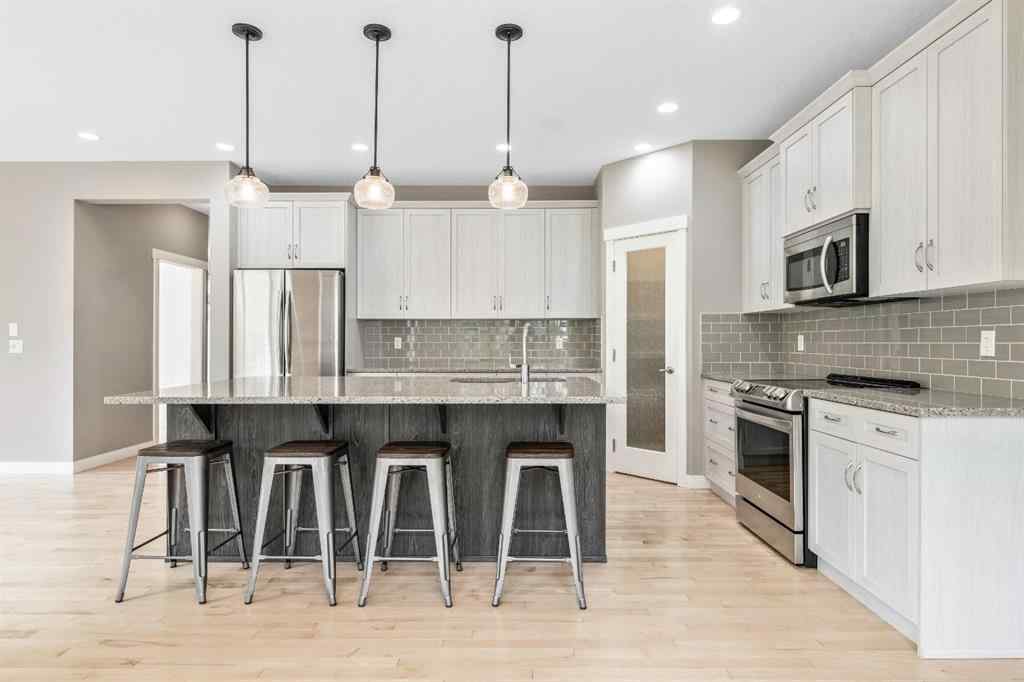 MLS® A2253125 - 21 Riviera Bay  in Riviera Cochrane, Residential