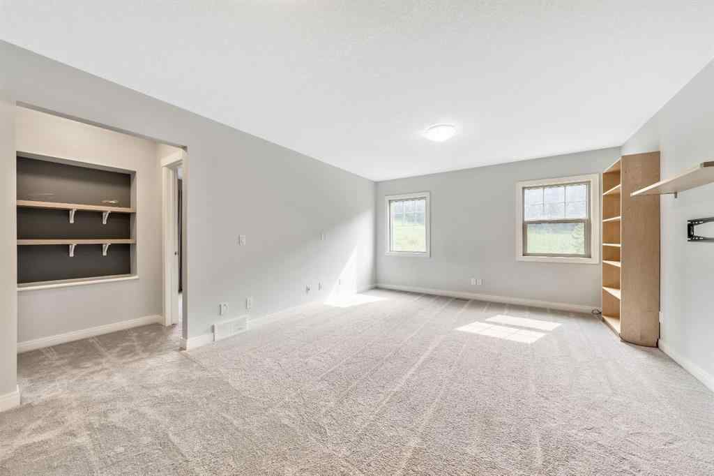 MLS® A2253125 - 21 Riviera Bay  in Riviera Cochrane, Residential