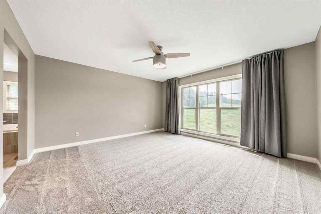 MLS® A2253125 - 21 Riviera Bay  in Riviera Cochrane, Residential