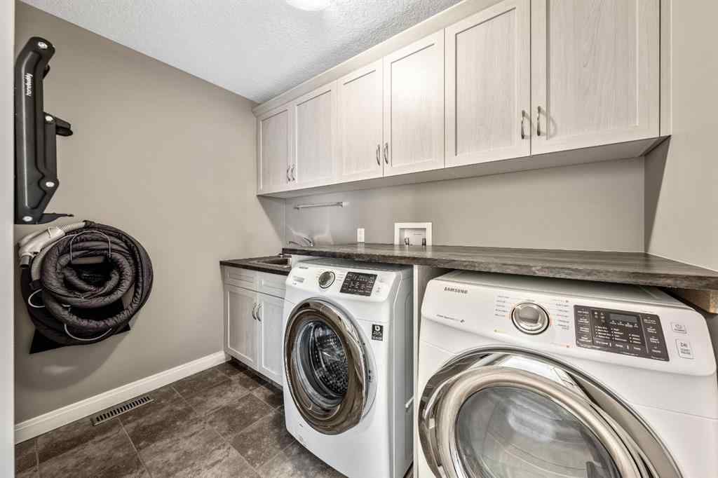 MLS® A2253125 - 21 Riviera Bay  in Riviera Cochrane, Residential