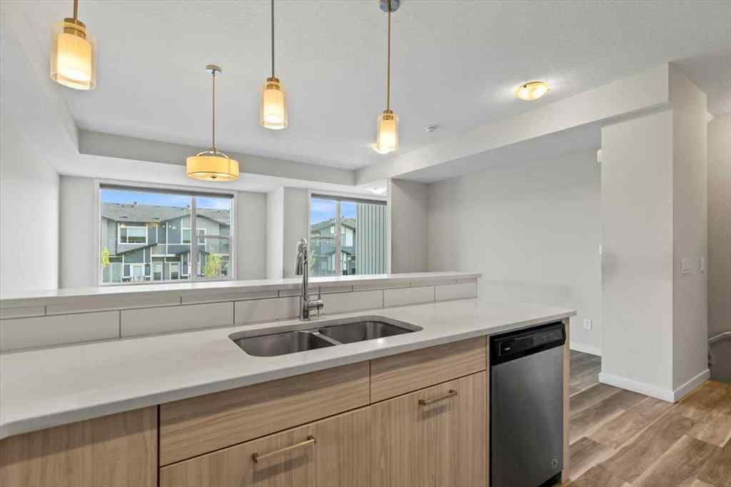MLS® A2253140 - 92 Saddlestone Drive NE in Saddle Ridge Calgary, Residential