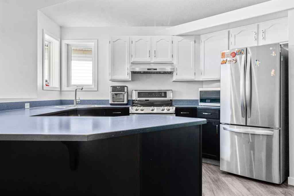 MLS® A2253150 - 295 Coventry Road NE in Coventry Hills Calgary, Residential