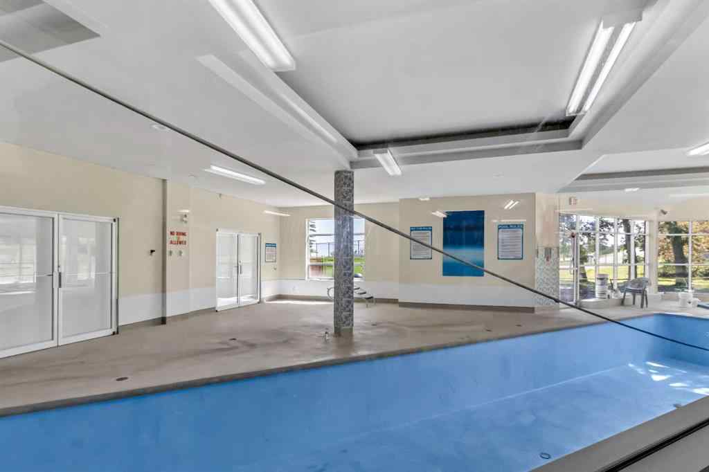 MLS® A2253157 - Unit #8 218 Village Terrace SW in Patterson Calgary, Residential