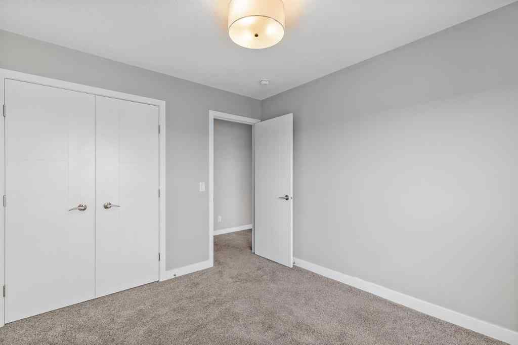 MLS® A2253174 - 119 Belmont Gardens SW in Belmont Calgary, Residential