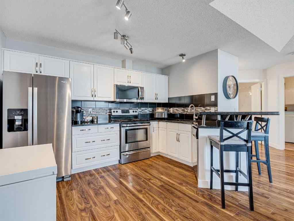 MLS® A2253178 - Unit #409 10 Sierra Morena Mews SW in Signal Hill Calgary, Residential