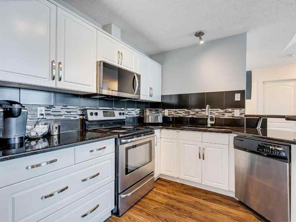 MLS® A2253178 - Unit #409 10 Sierra Morena Mews SW in Signal Hill Calgary, Residential