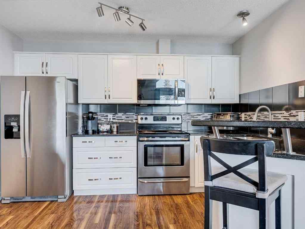 MLS® A2253178 - Unit #409 10 Sierra Morena Mews SW in Signal Hill Calgary, Residential