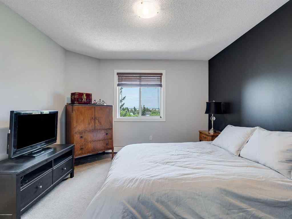 MLS® A2253178 - Unit #409 10 Sierra Morena Mews SW in Signal Hill Calgary, Residential