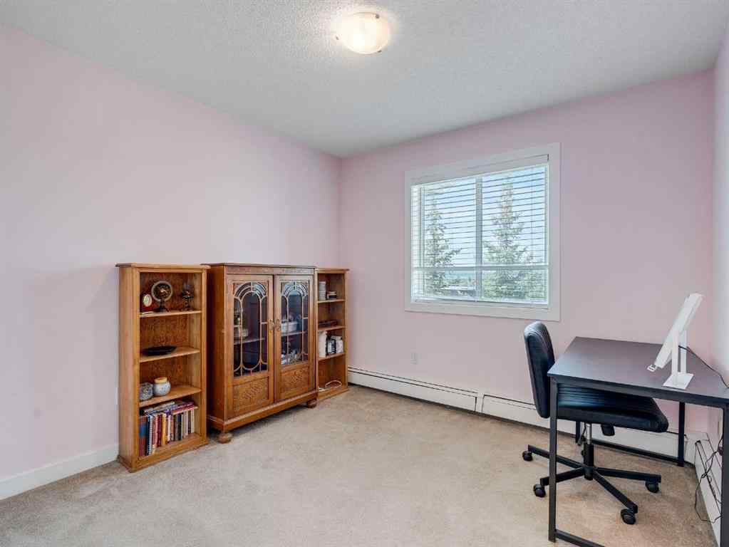 MLS® A2253178 - Unit #409 10 Sierra Morena Mews SW in Signal Hill Calgary, Residential