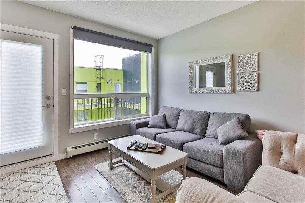 MLS® A2253194 - Unit #402 1740 9 Street NW in Mount Pleasant Calgary, Residential