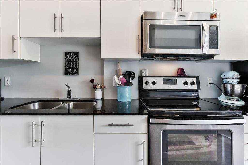 MLS® A2253194 - Unit #402 1740 9 Street NW in Mount Pleasant Calgary, Residential