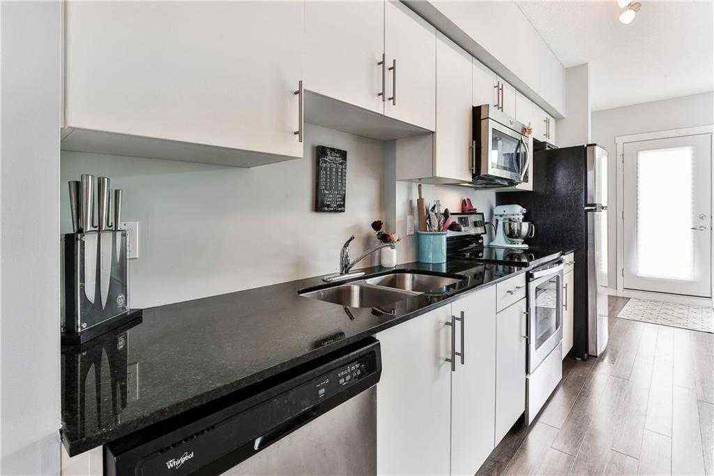 MLS® A2253194 - Unit #402 1740 9 Street NW in Mount Pleasant Calgary, Residential