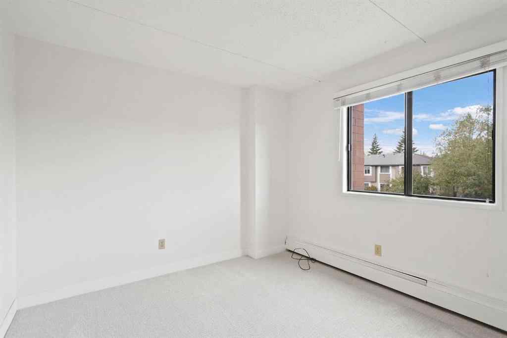 MLS® A2253210 - Unit #216 5204 Dalton Drive NW in Dalhousie Calgary, Residential