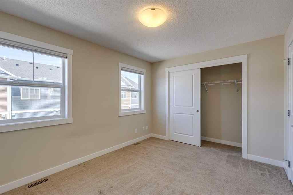 MLS® A2253218 - Unit #605 1225 Kings Heights Way SE in Kings Heights Airdrie, Residential