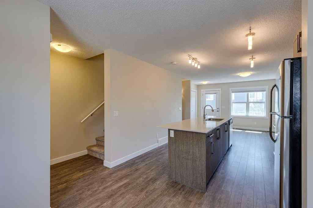 MLS® A2253218 - Unit #605 1225 Kings Heights Way SE in Kings Heights Airdrie, Residential