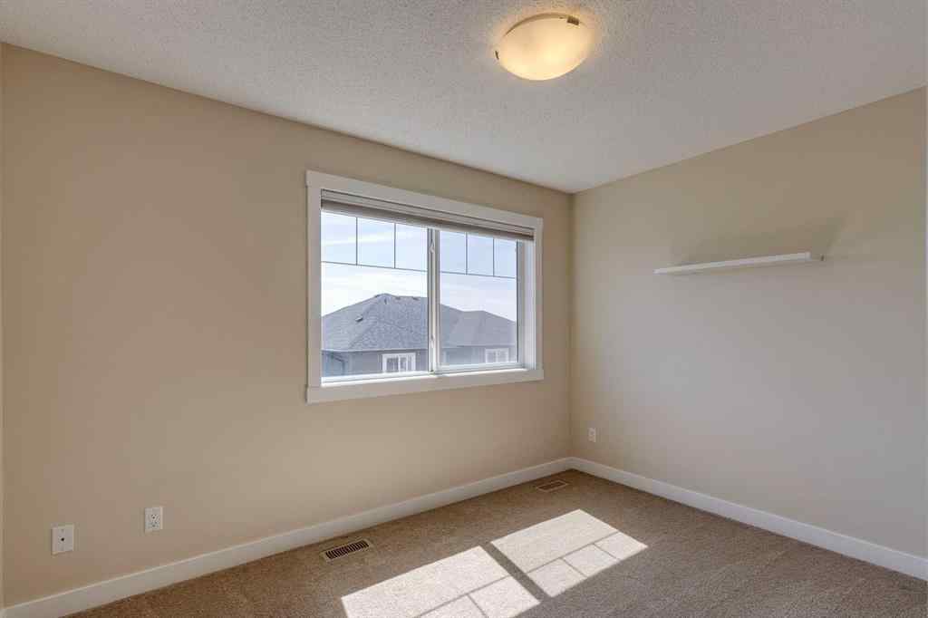 MLS® A2253218 - Unit #605 1225 Kings Heights Way SE in Kings Heights Airdrie, Residential