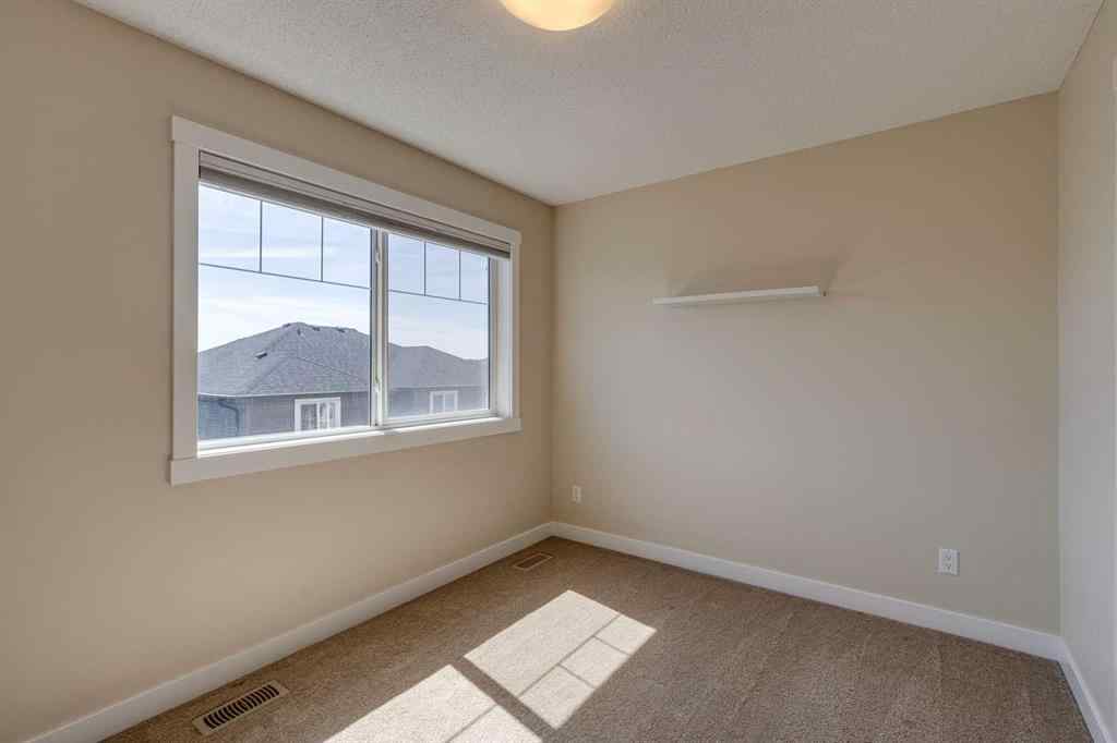 MLS® A2253218 - Unit #605 1225 Kings Heights Way SE in Kings Heights Airdrie, Residential