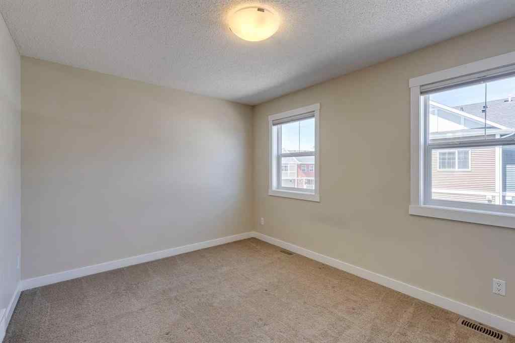 MLS® A2253218 - Unit #605 1225 Kings Heights Way SE in Kings Heights Airdrie, Residential