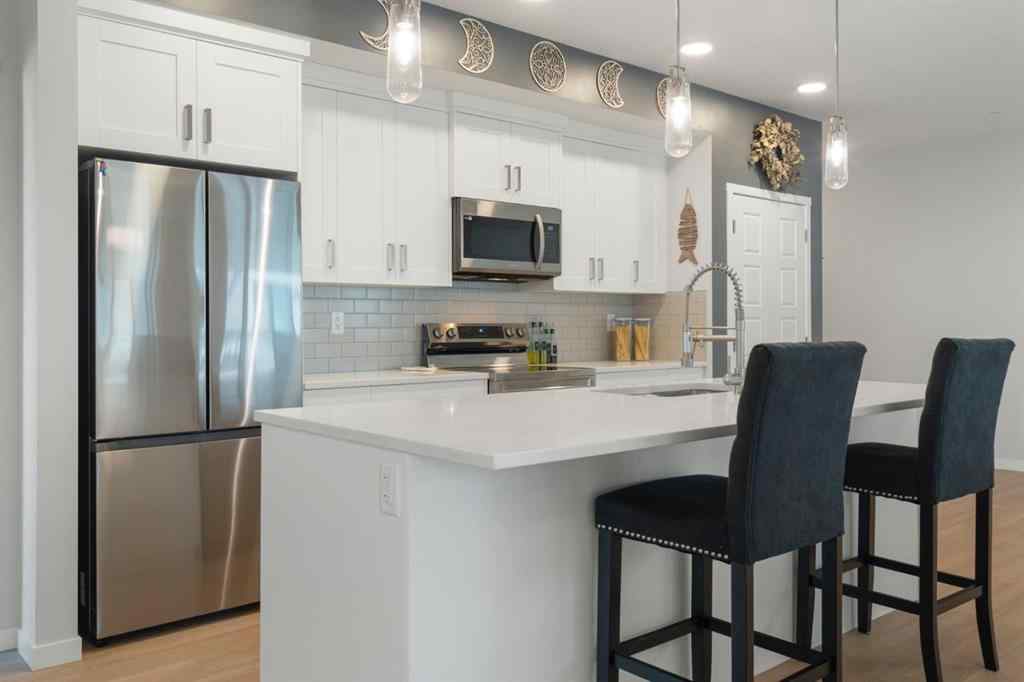 MLS® A2253220 - Unit #2203 42 Cranbrook Gardens SE in Cranston Calgary, Residential
