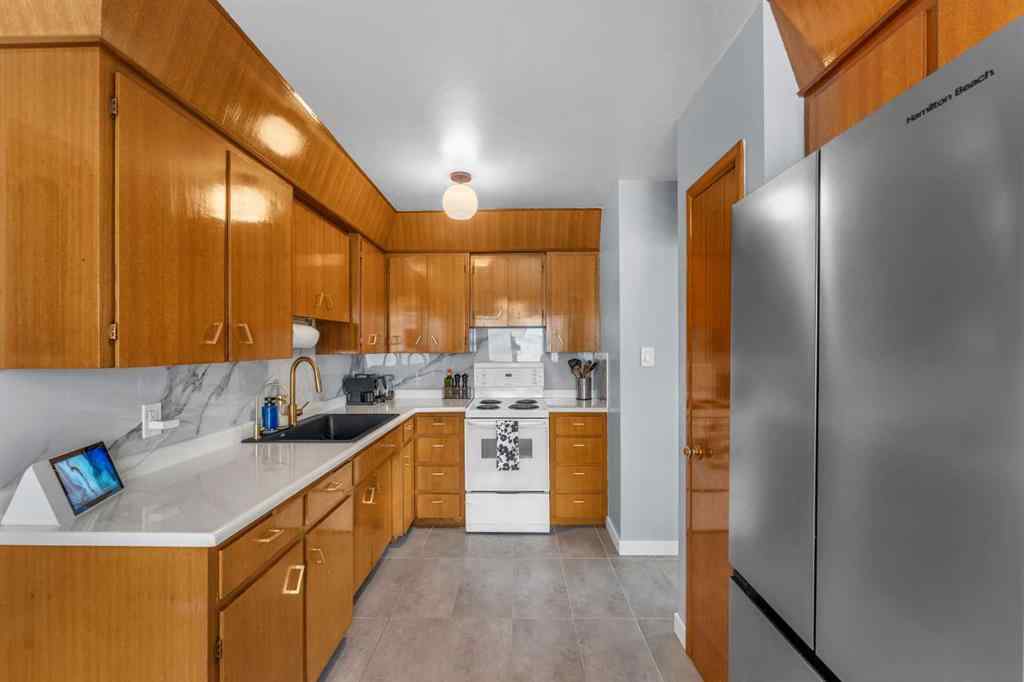 MLS® A2253259 - 120A 27 Avenue NE in Tuxedo Park Calgary, Residential