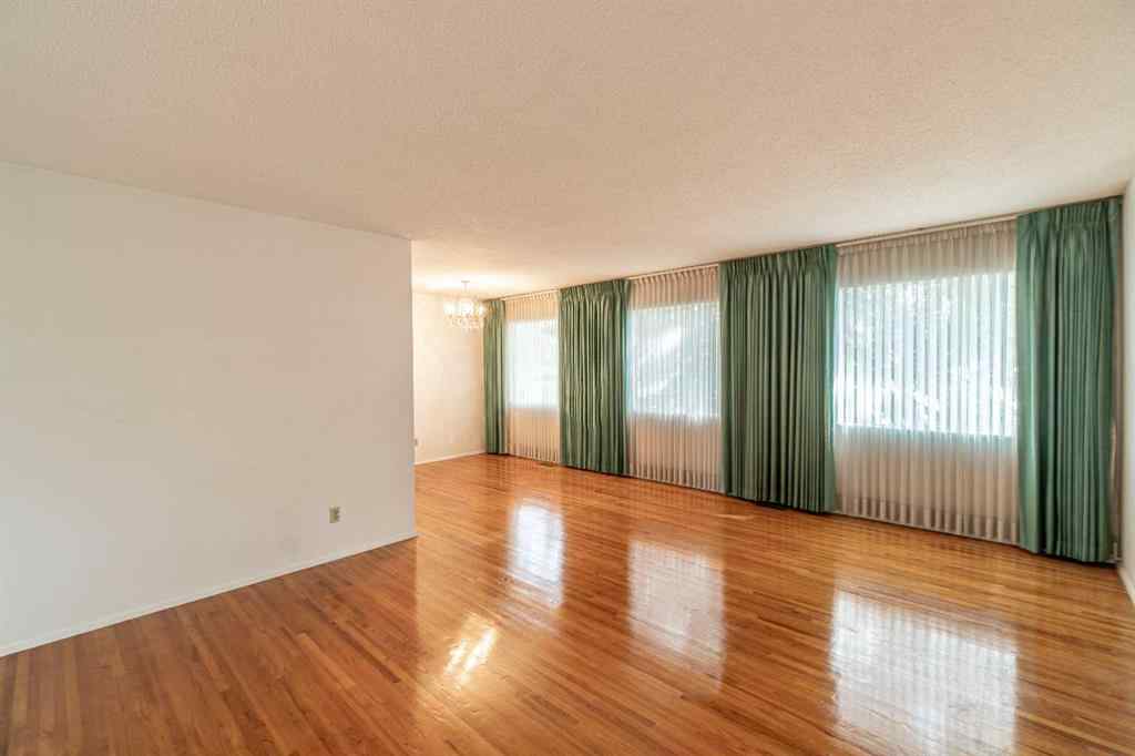 MLS® A2253277 - 1099 Acadia Drive SE in Lake Bonavista Calgary, Residential