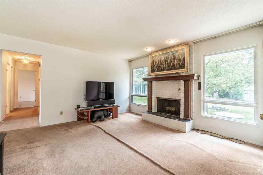 MLS® A2253277 - 1099 Acadia Drive SE in Lake Bonavista Calgary, Residential
