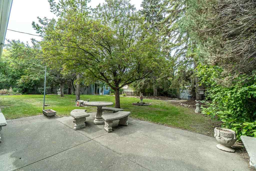 MLS® A2253277 - 1099 Acadia Drive SE in Lake Bonavista Calgary, Residential
