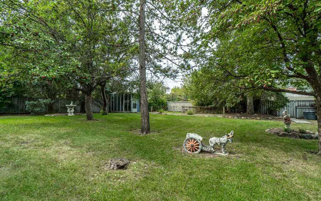 MLS® A2253277 - 1099 Acadia Drive SE in Lake Bonavista Calgary, Residential