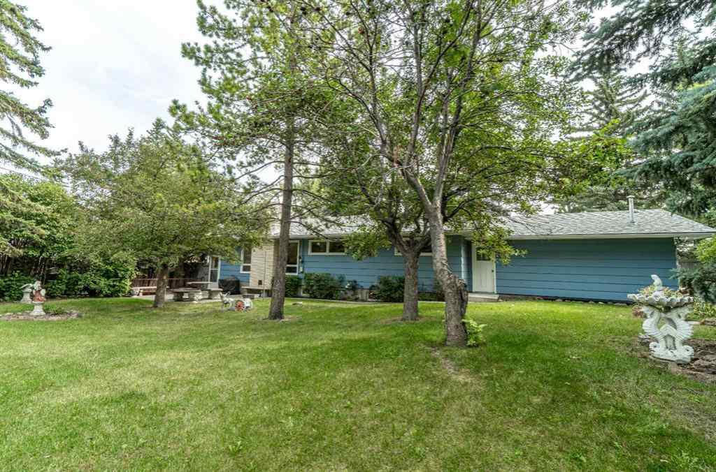MLS® A2253277 - 1099 Acadia Drive SE in Lake Bonavista Calgary, Residential