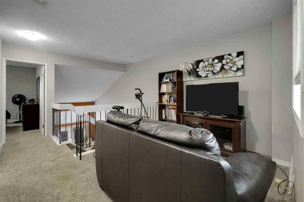 MLS® A2253310 - Unit #17 41 Glenbrook Crescent  in Glenbow Cochrane, Residential