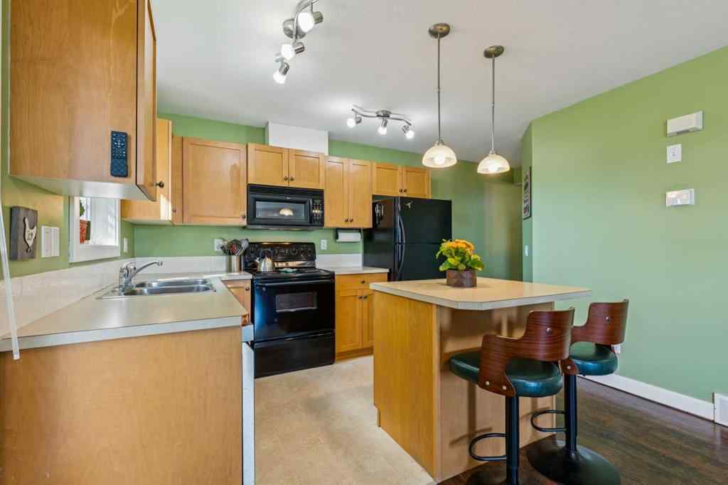 MLS® A2253315 - Unit #218 50 Westland Road  in Westridge Okotoks, Residential