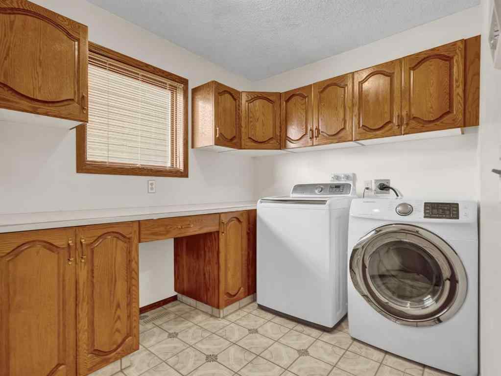 MLS® A2253326 - 99 Hawkcliff Way NW in Hawkwood Calgary, Residential