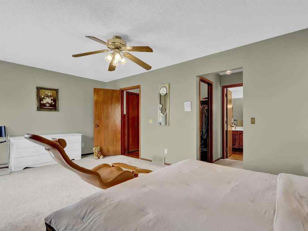MLS® A2253326 - 99 Hawkcliff Way NW in Hawkwood Calgary, Residential