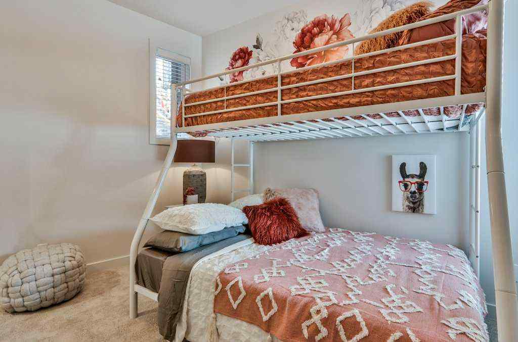 MLS® A2253332 - Unit #202L 209 Stewart Creek Rise  in Three Sisters Canmore, Residential