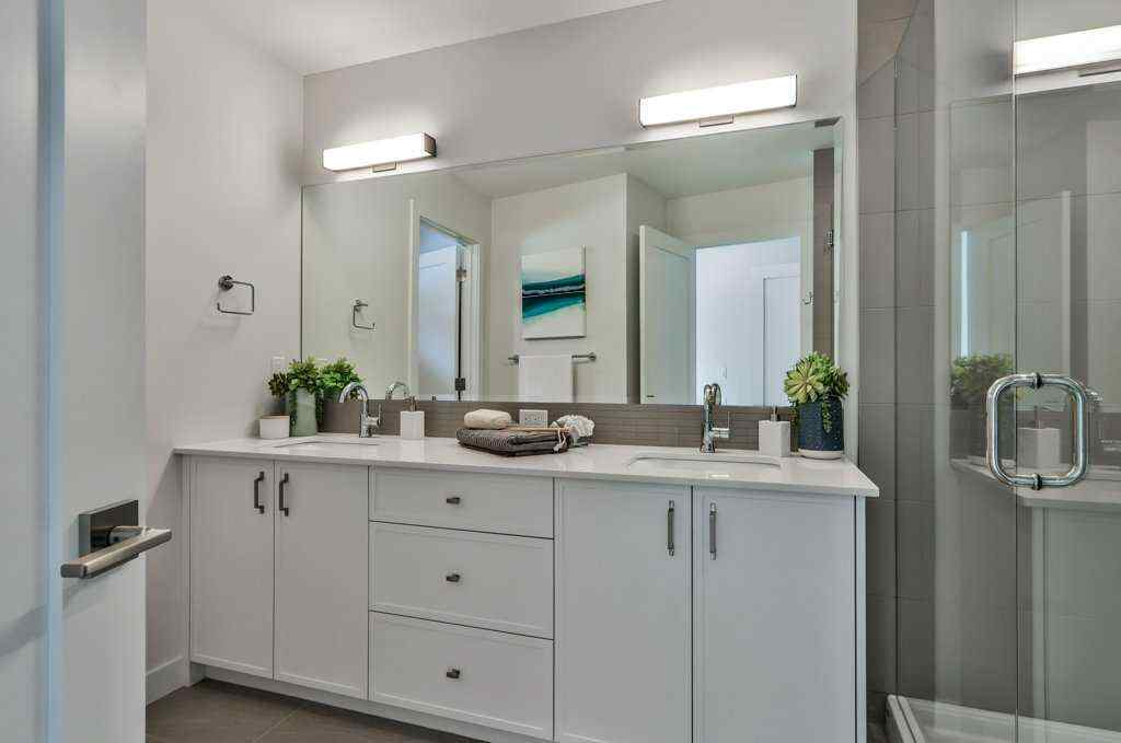MLS® A2253332 - Unit #202L 209 Stewart Creek Rise  in Three Sisters Canmore, Residential
