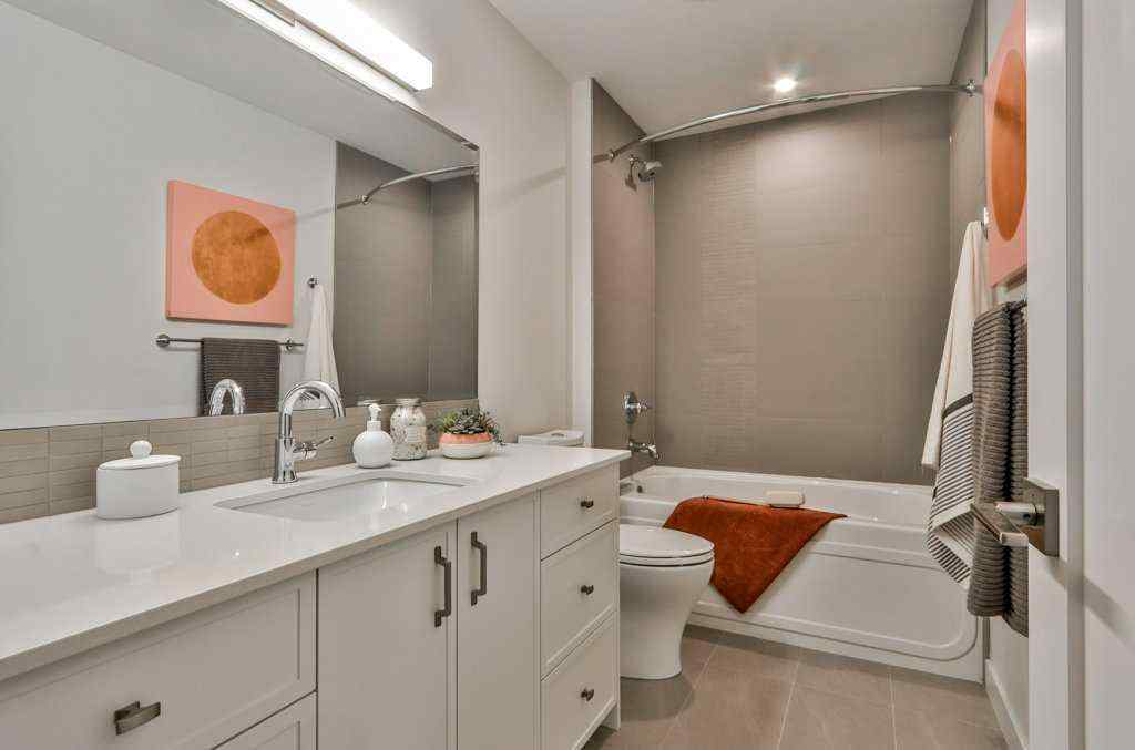 MLS® A2253332 - Unit #202L 209 Stewart Creek Rise  in Three Sisters Canmore, Residential