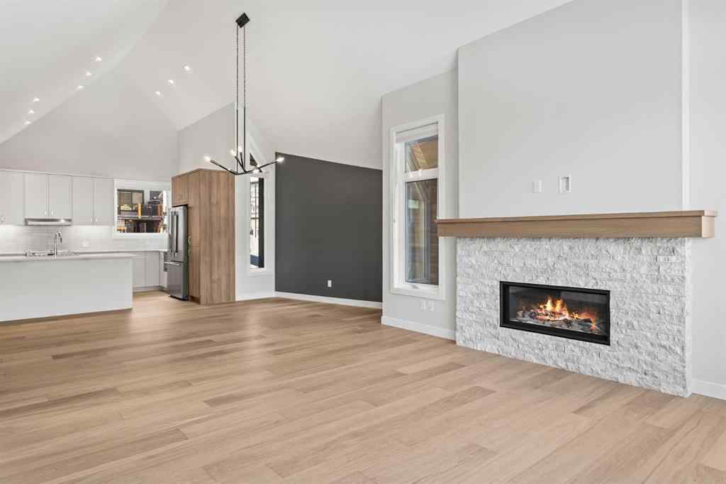 MLS® A2253332 - Unit #202L 209 Stewart Creek Rise  in Three Sisters Canmore, Residential