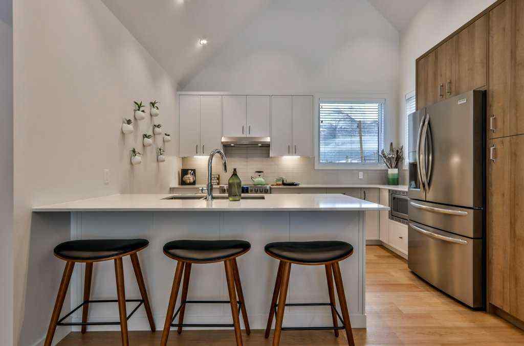 MLS® A2253332 - Unit #202L 209 Stewart Creek Rise  in Three Sisters Canmore, Residential