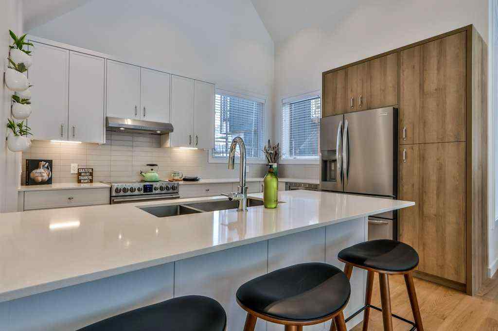 MLS® A2253332 - Unit #202L 209 Stewart Creek Rise  in Three Sisters Canmore, Residential