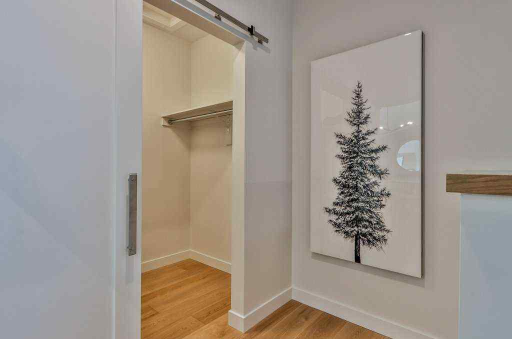MLS® A2253332 - Unit #202L 209 Stewart Creek Rise  in Three Sisters Canmore, Residential