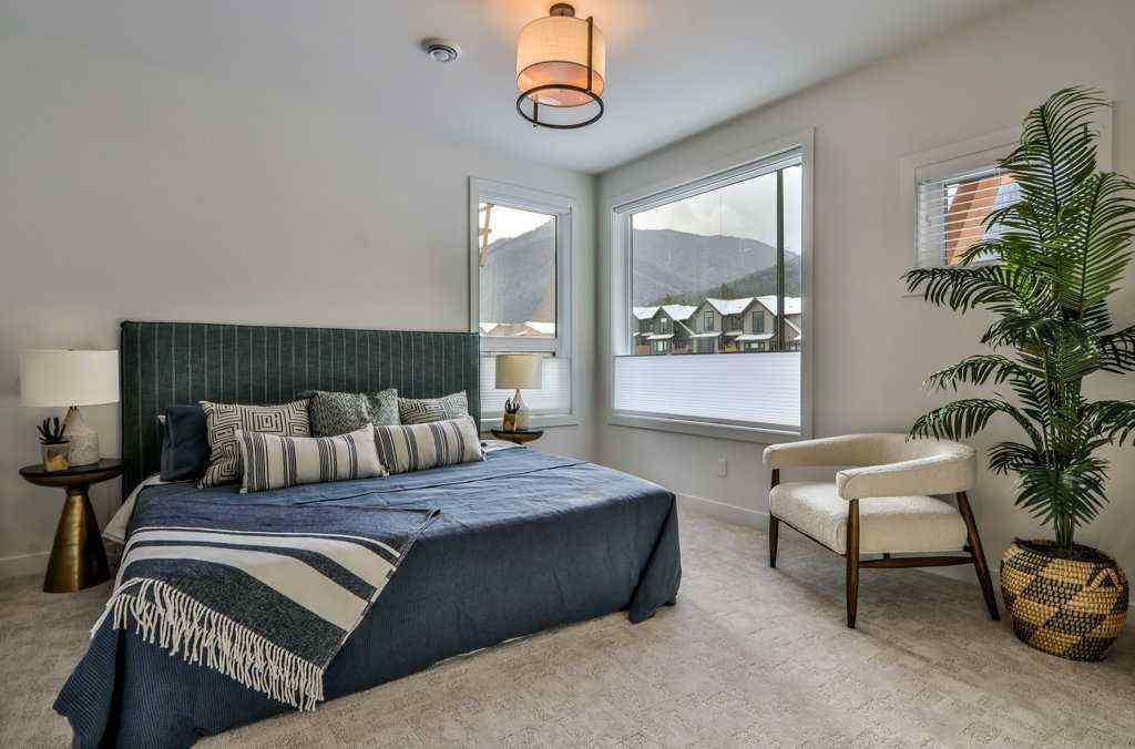 MLS® A2253332 - Unit #202L 209 Stewart Creek Rise  in Three Sisters Canmore, Residential