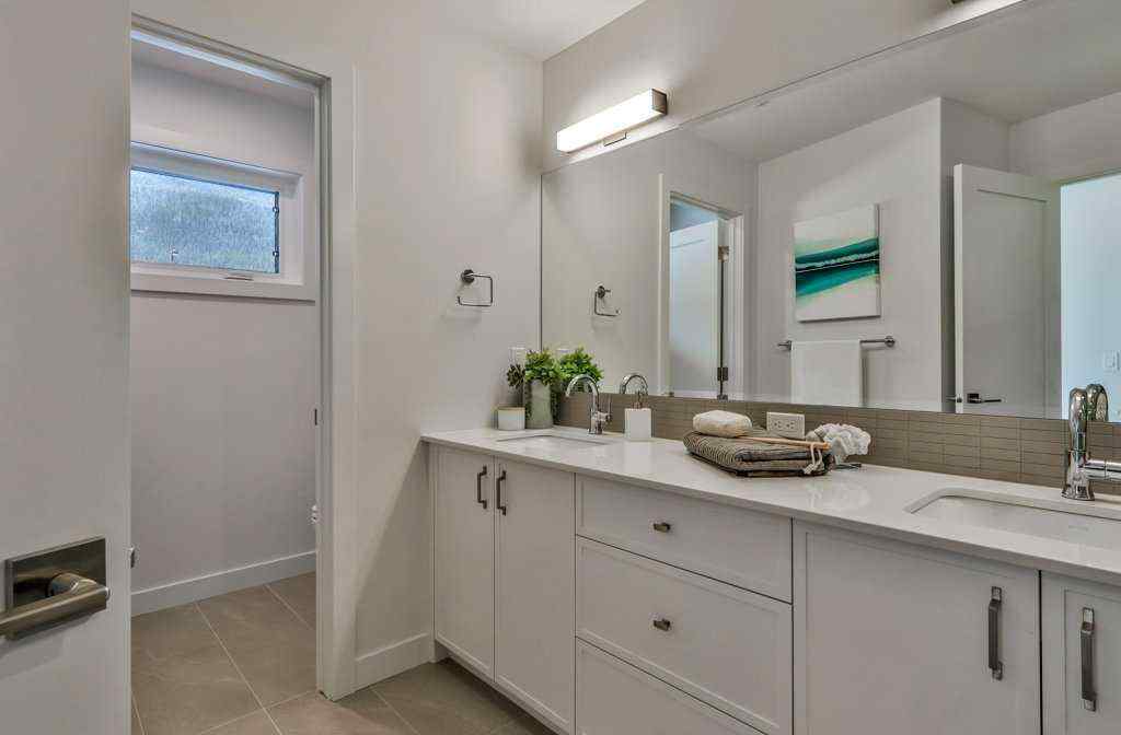 MLS® A2253332 - Unit #202L 209 Stewart Creek Rise  in Three Sisters Canmore, Residential
