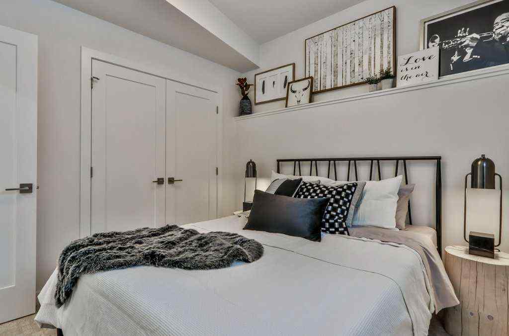 MLS® A2253332 - Unit #202L 209 Stewart Creek Rise  in Three Sisters Canmore, Residential