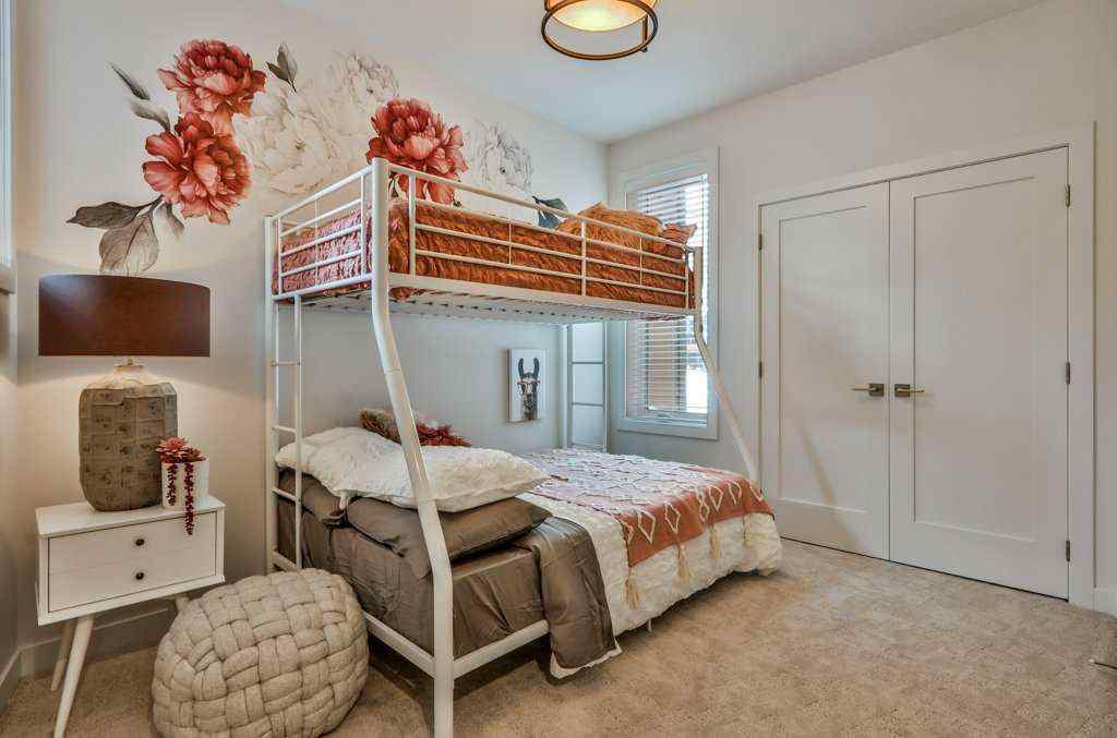 MLS® A2253332 - Unit #202L 209 Stewart Creek Rise  in Three Sisters Canmore, Residential
