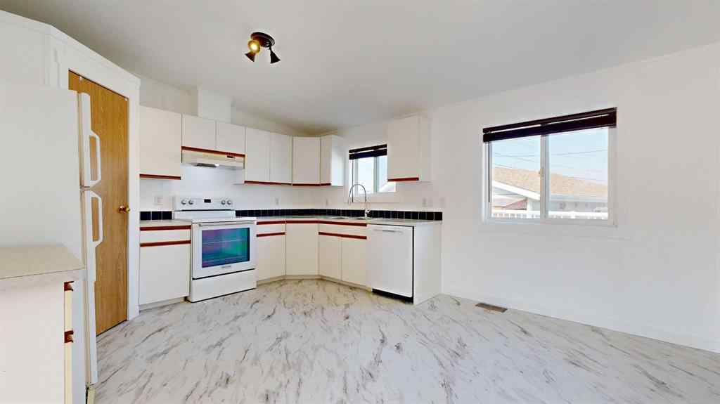 MLS® A2253382 - 9714 106 Avenue  in N/A Clairmont, Residential