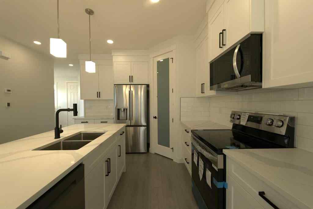 MLS® A2253391 - 1117 Iron Ridge Avenue  in NONE Crossfield, Residential