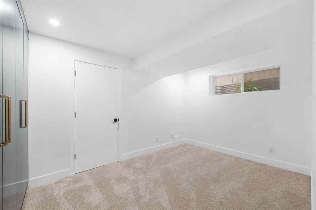 MLS® A2253393 - 168 Spring Crescent SW in Springbank Hill Calgary, Residential