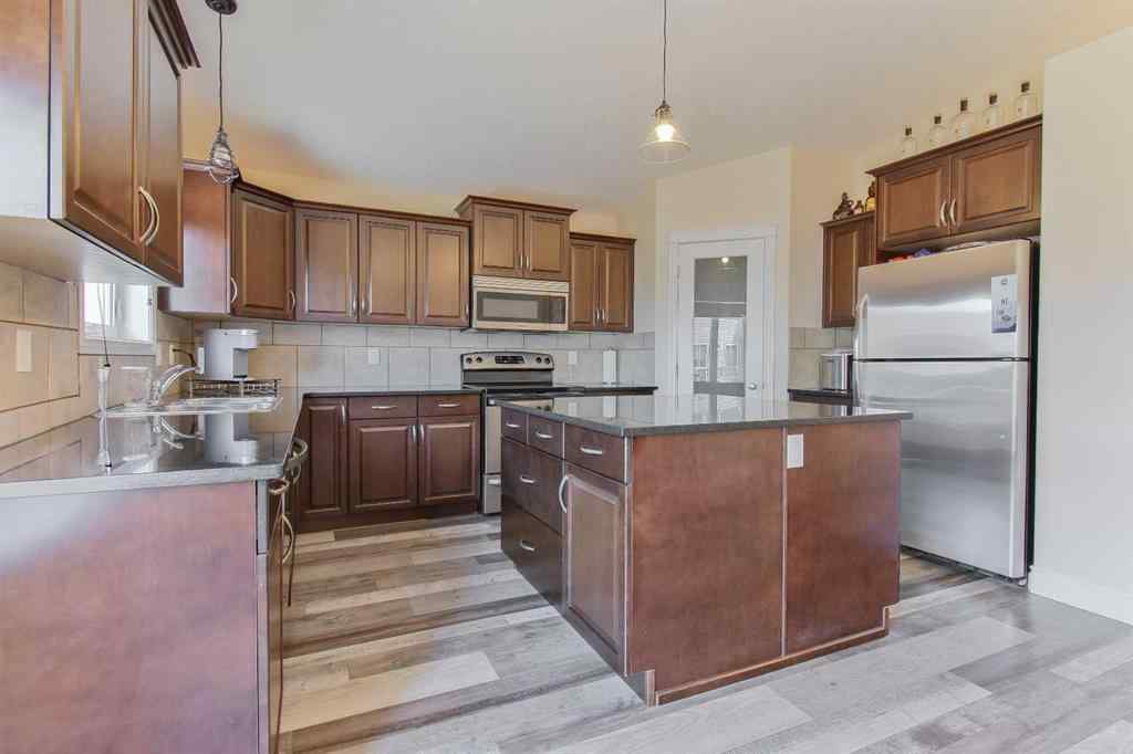 MLS® A2253408 - 223 Gateway Manor S in Fairmont Lethbridge, Residential