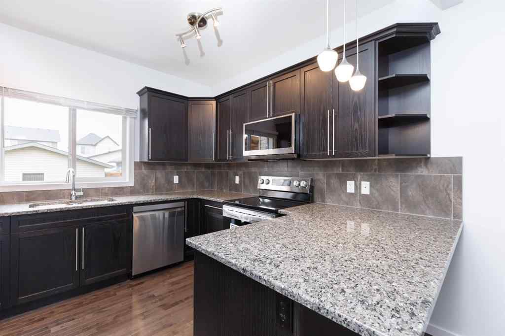 MLS® A2253409 - 2461 Ravenswood View SE in Ravenswood Airdrie, Residential