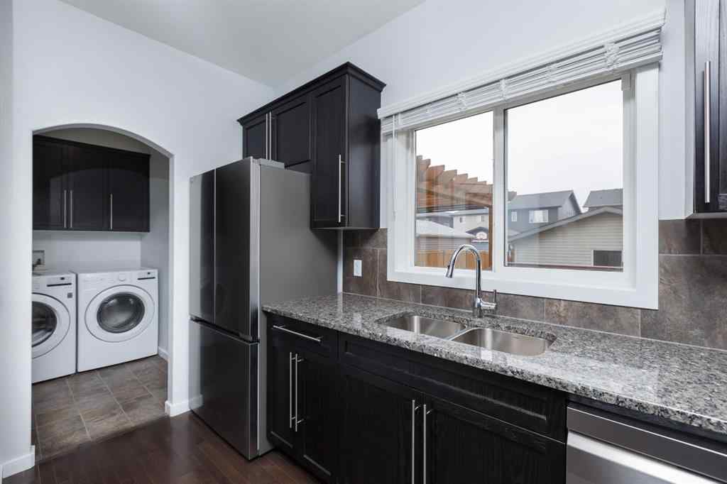MLS® A2253409 - 2461 Ravenswood View SE in Ravenswood Airdrie, Residential